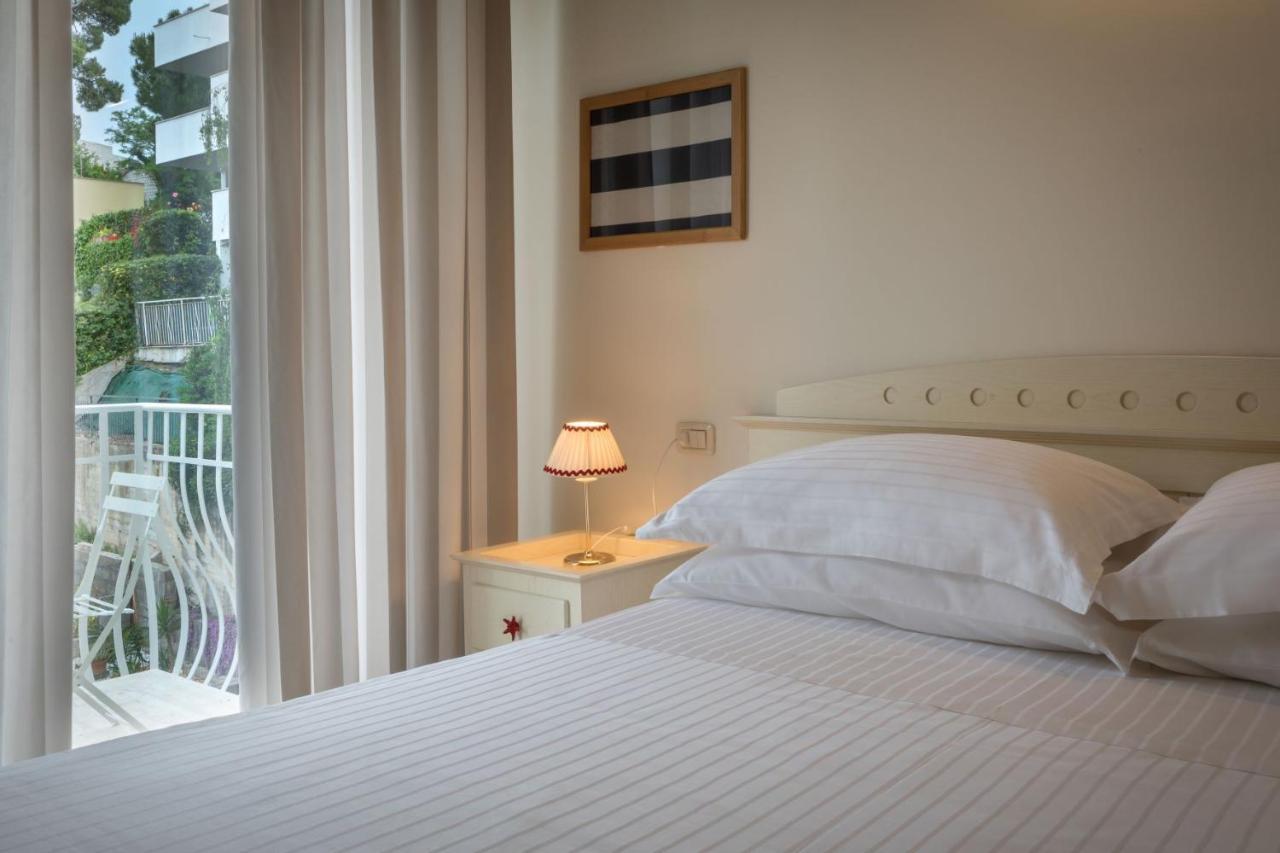 Mure Hotel Нумана Экстерьер фото