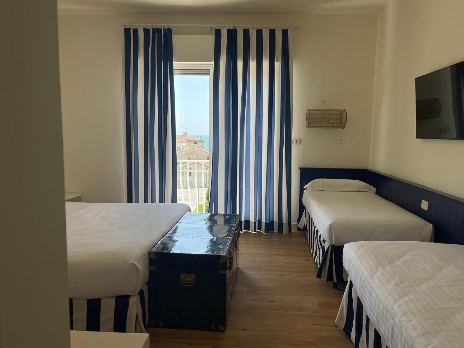 Mure Hotel Нумана Экстерьер фото